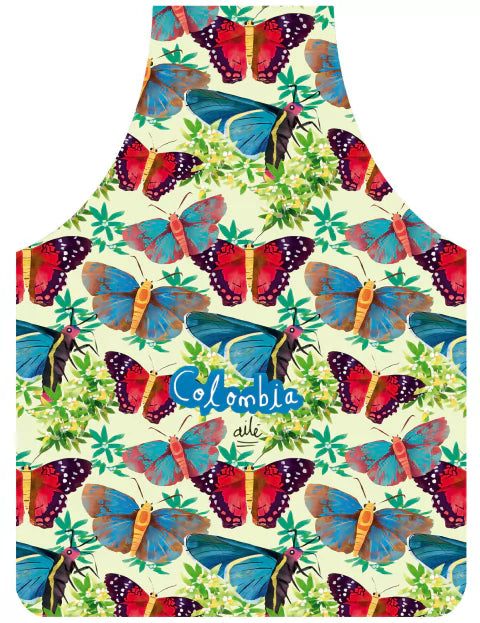 Delantal antifluido inspirado en las mariposas tropicales de Colombia, colección biodiversidad Ailé, Colombian butterfly gift, Morpho butterfly Colombia souvenir, delantal ilustrado, regalo original para amantes de la cocina y la naturaleza, colombianos en el exterior y turistas, regal sostenible. Ailé