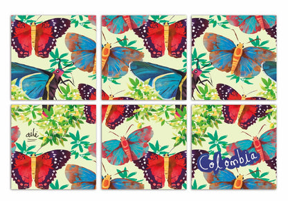 Set de portavasos con ilustración , ilustrado con mariposas colombianas en azul y rojo, souvenir de biodiversidad, diseño original Ailé Colombia, estampado mariposas Colombia, diseño mariposas tropicales, set mesa colombiana, posavasos colombianos, apoyavasos de diseño colombiano,artesanía moderna colombiana.aile