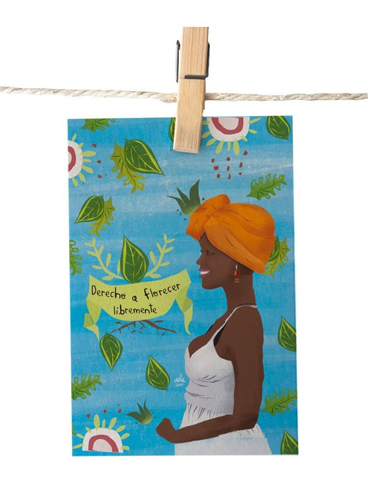 Detalle ilustración con mujer afro y frase "Derecho a florecer libremente"  diversidad étnica colombiana, regalo mujer afrodescendiente Colombia, diversidad étnica colombiana, colección femenina colombiana, postal para enviar Colombia, sustainable paper postcard Colombia, tarjeta postal recuerdo Colombia, postal coleccionable colombiana, Colombian souvenir postcard, tarjetas postales colombianas online, postal souvenir Colombia fauna, postales souvenir hechas en Colombia. Ailé